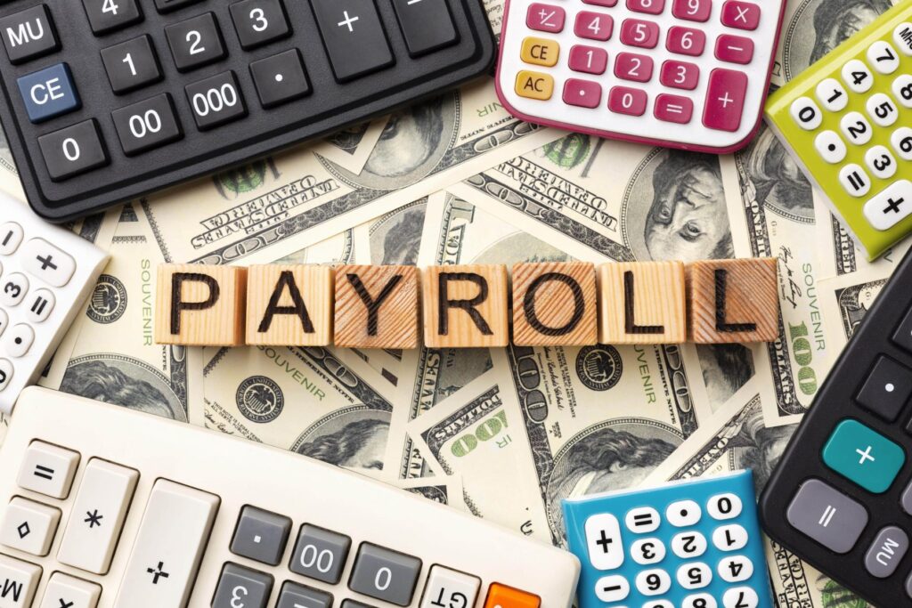 top-view-payroll-concept-with-cash-min-scaled
