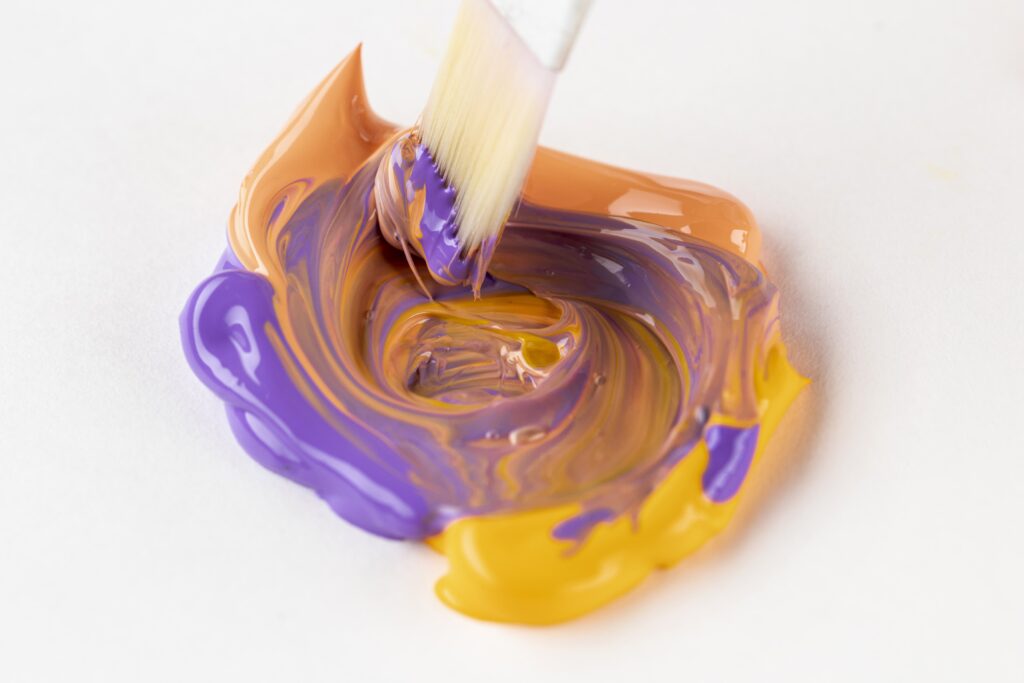 mixed-purple-orange-yellow-paint-min