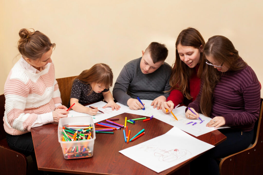 children-with-down-syndrome-drawing-together (1)