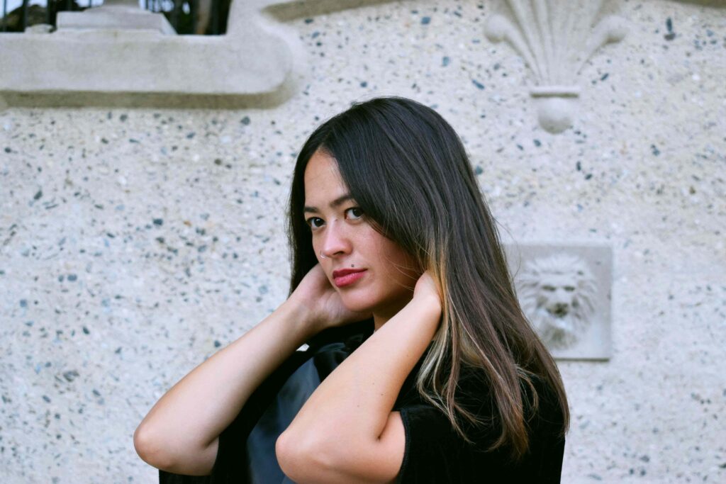 free-photo-of-young-beautiful-woman-fixing-hair-compressed