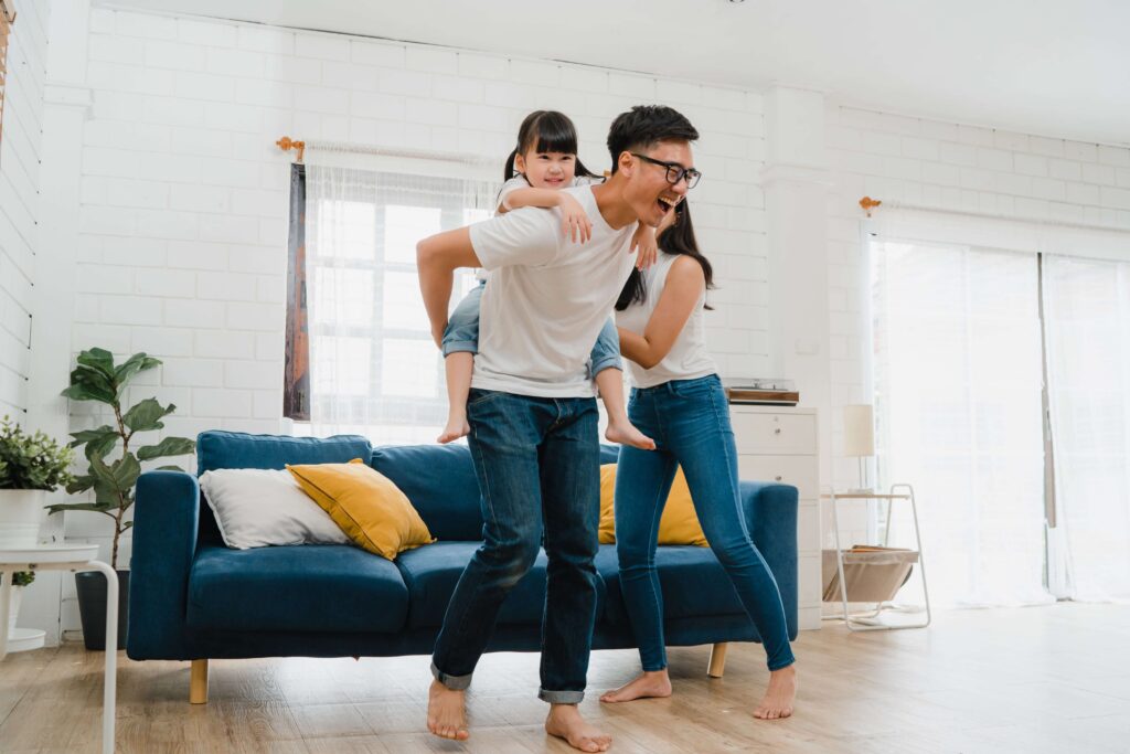 happy-cheerful-asian-family-dad-mom-daughter-having-fun-playing-min (1)