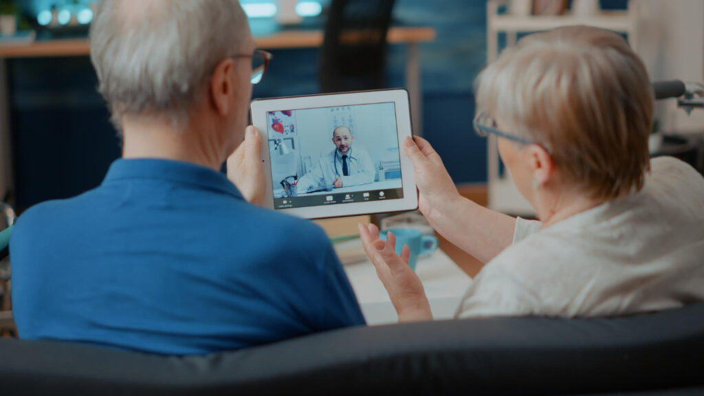 senior-couple-attending-online-meeting-with-doctor-digital-tablet-doing-remote-consultation-home-elder-people-using-videoconference-call-modern-gadget-internet-telemedicine